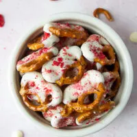 Bowl of strawberry white chocolate dipped pretzels