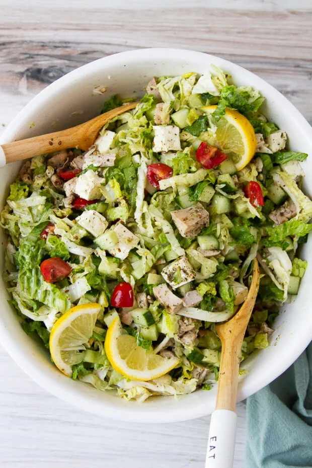 Finished grilled chicken salad in a serving bowl.