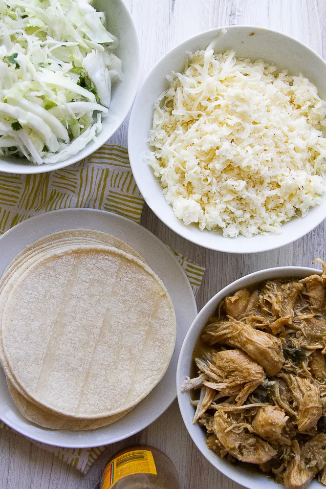 Crispy Chicken taco ingredients in bowls.