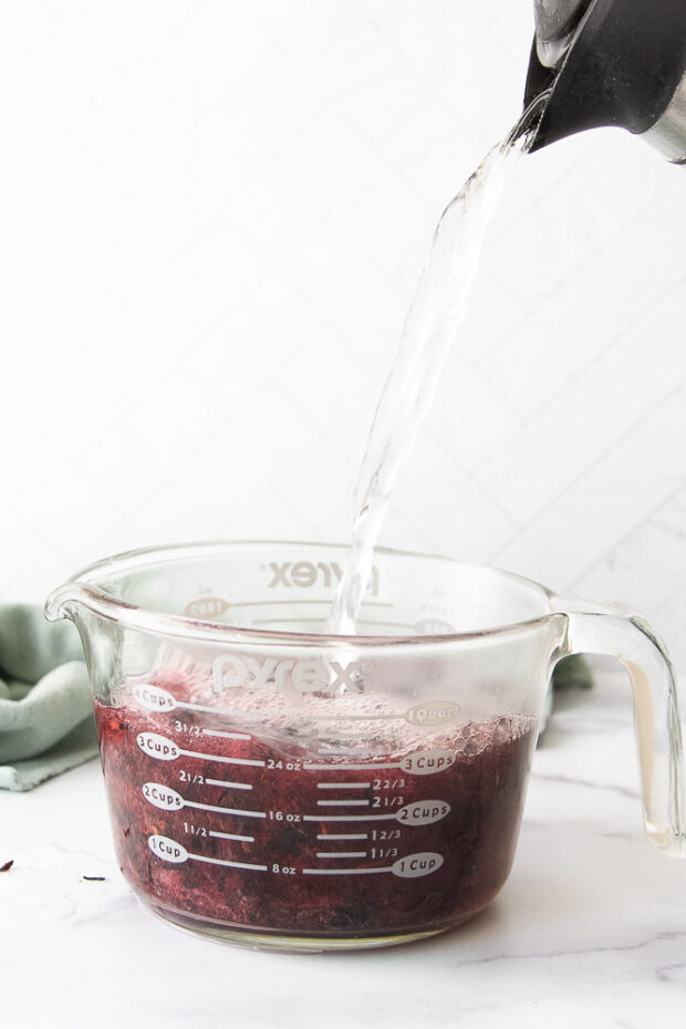 boiling water poured over the dried hibiscus flowers