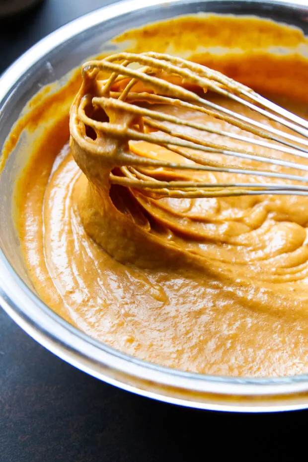 Filling ingredients whisked together in a bowl.