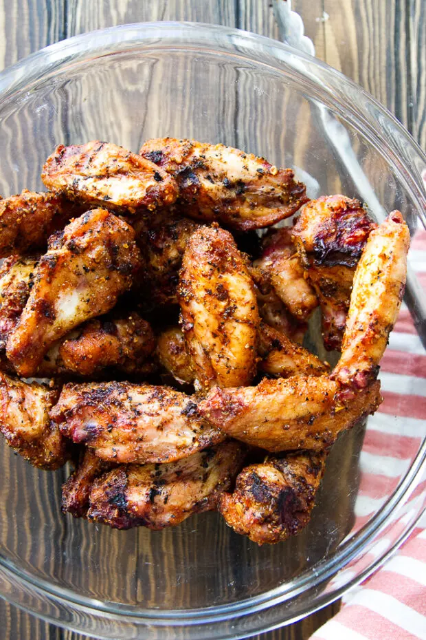 Smoked chicken wings fresh off the grill in a bowl.