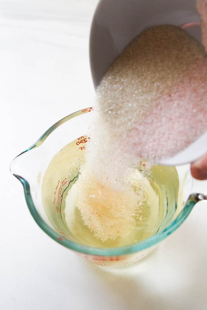 Salt and sugar added to the vinegar for the pickled vegetables.